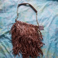 Bohemian Monserat De Luca Tan Suede Fringe Handbag. Great Condition, New With Tags. Black Lining With Zippered Pocket. Gold Chain Strap With Leather. Length 12" With Fringe 20". Width Side To Side 15". Gorgeous High Quality. Goat Leather. Designer Brown Flap Shoulder Bag, Designer Brown Bags As Fashion Accessory, Designer Brown Bag As Fashion Accessory, Brown Evening Shoulder Bag With Detachable Handle, Elegant Brown Hobo Bag For Evening, Evening Brown Hobo Bag With Leather Handles, Brown Hobo Bag With Leather Handles For Evening, Brown Leather Handle Hobo Bag For Evening, Luxury Brown Tote Evening Bag