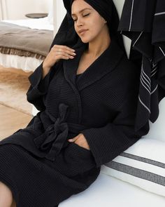 Comfort meets style in this cozy, made-to-perfection micro waffle weave bathrobe in black. The relaxed fit makes it the ultimate lounge piece, whether you're getting ready for the day or bingeing your favorite Netflix show. Made with 100% organic Turkish cotton, the plush micro waffle weave helps to absorb moisture quicker so you can spend less time drying off and more time lounging around. Approx. Length S/M: 40" Length (101cm Length) Approx. Length L/XL: 42" Length (106cm Length) Color: Black Black Winter Loungewear Robe, Winter Black Robe For Loungewear, Black Long Sleeve Robe For Loungewear, Netflix Show, Black Towels, Wool Dryer Balls, Whale Tail, Waffle Weave, Tie Dye Patterns