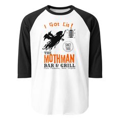 Mothman Bar & Grill "I Got Lit" faux souvenir baseball raglan with black 3/4 sleeves and white body.  Urban legends, cryptids, aliens, outlandish conspiracy theories... I love 'em all! The Mothman was first seen around Point Pleasant, WV in 1966 and has been capturing our imagination (and hearts) ever since. This satirical souvenir t-shirt is my tribute to The Moth... The Man... The legendary Mothman.   * Soft ring-spun cotton blend. * Fine jersey knit * Contrasting black raglan ¾ sleeves and co Cotton Baseball Jersey With Short Sleeves For Fans, Cotton Short Sleeve Baseball Jersey For Fans, Baseball Jersey With Crew Neck For Fans, Cotton Sports Fan Baseball Jersey For Fans, Cotton Baseball Jersey For Fan Merchandise, Cotton Baseball Jersey For Streetwear, Fan Apparel Baseball Jersey With Graphic Print, Fan Apparel Crew Neck Baseball Jersey, Sports Fan Baseball Jersey With Graphic Print