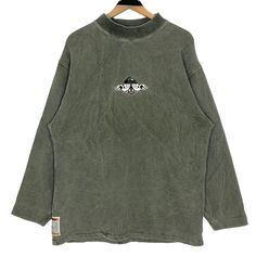 Vintage 90s Quiksilver crewneck sweatshirt in faded green colour. Pullover sweater with embroidered logo on the front. Still in good condition EXCEPT little faded and loose on the neck and hem. SEE THE PICTURES FOR MORE DETAILS. CONDITION : 7/10 MEASUREMENT Pit : 23 inch Length : 30 inch Shoulder : 22 inch Arm Length : 23 inch Size On Tag : M Recommended Size : L PAYMENT We accept PayPal only. The item will be ship 3-5 days once the payment has been made. NORMAL SHIPPING FEDEX USUALLY AROUND 7-2 Vintage Surfwear, Pull Oversize, Embroidery Sweater, Surf Wear, Logo Embroidery, Pullover Sweatshirts, Embroidery Logo, Pullover Sweaters, Crewneck Sweatshirt