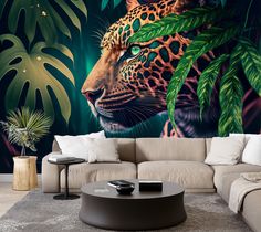 a living room with a couch, coffee table and wall mural depicting a leopard in the jungle