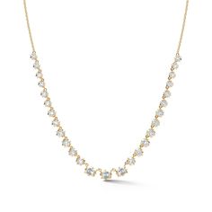 This tennis-style eternity necklace is the perfect hint of classic while firmly rooted in the present. The Vanguard Diamond Riviera Necklace combines the classic tennis silhouette with our signature Alchemy setting to bring forward a modern feel. Handcrafted in 18-karat gold and featuring 3 emerald-cut and 22 round, brilliant cut diamonds, the Vanguard Riviera Necklace is a show-stopping must-have for any jewelry collection. Combine this necklace with heavier chain pieces like the Pia and Phoebe Yellow Gold Tennis Necklace With Prong Setting, Yellow Gold Brilliant Cut Tennis Necklace, Tennis Silhouette, Riviera Necklace, Eternity Necklace, Tennis Style, Bespoke Engagement Ring, Heavy Chain, Gold Ear Cuff