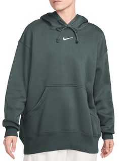 Grounded in style, comfort and versatility, meet Nike's take on luxury loungewear. This classic hoodie helps you stay cozy all day long, thanks to midweight fleece that feels soft yet structured. Plus, exaggerated details (like taller ribbing and oversized fit) give you a trend-right look. Fit & Design: Oversized fit: exaggerated and spacious Fits large; we recommend ordering a size down Midweight brushed fleece feels extra soft on the inside and smooth on the outside, helping you stay cozy while keeping its structured shape Dropped shoulders and roomy sleeves provide a relaxed, oversized feel Drawcord hood Elongated ribbing Oversized pocket Embroidered Swoosh logo Nike Sportswear Phoenix Fleece, Black Dress Trousers, Luxury Loungewear, Women's Sportswear, Loungewear Luxury, Mens Formal, Swoosh Logo, Oversized Pullover, Formal Shirts For Men