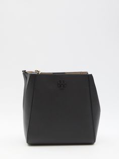 This black leather Mcgraw bucket bag boasts an embossed Double T logo on the front. It comes with a detachable top handle, an adjustable and detachable shoulder strap, and a press-stud closure. The main interior compartment is accompanied by two slip pockets for extra organization. Dimensions: 9.8x10x4.3 inches Size nationality: UNI Product number: 6767255 Product code: 158499001 Composition: 100% leather Black Bucket Bag With Detachable Handle For Business, Black Business Bucket Bag With Detachable Handle, Black Business Bucket Bag With Gold-tone Hardware, Black Bucket Bag With Gold-tone Hardware For Business, Black Bucket Bag With Detachable Handle For Work, T Logo, Women Men Shoes, Designer Shoulder Bags, Leather Shops