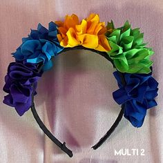 This cute Mexican Headband is made with a ribbon shaped like cute flowers. Available in both child and adult sizes. Perfect for any Mexican-themed party or event. Item can be special ordered if out of stock or for your SPECIAL EVENT. Please contact us for more info. Mexican Headband, Ribbon Headbands, Floral Ribbon, Cute Flowers, Your Special, Orange And Purple, Themed Party, Green And Orange, Special Event