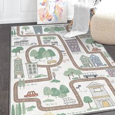 a child's rug with a road map on it