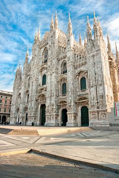 the large cathedral has many spires on it's sides