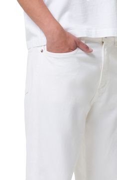 Relaxed but not baggy, these tapered jeans are made from nicely draped nonstretch denim in a bright-white wash that looks good any time of year. 30 1/2" inseam; 14" leg opening; 12" front rise; 14" back rise (size 29) Zip fly with button closure Five-pocket style 100% organic cotton Machine wash, tumble dry Made in Turkey White Summer Jeans With Five Pockets, Modern White Cotton Jeans, Classic White Cropped Leg Jeans, Classic White Cropped Jeans, White Cropped Jeans With Five Pockets, White Cropped Jeans For Summer, White Tapered Leg Jeans, Classic White Tapered Leg Jeans, White Tapered Cotton Pants