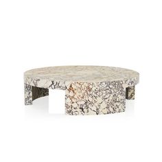 an oval marble coffee table with metal legs