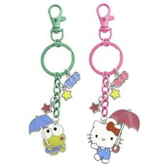 two key chains with hello kitty characters on them