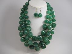 "Chunky forest green necklace, multi strand statement apple green necklace, beaded necklace, big green beads, forest green statement jewelry, matching earrings, BEST SELLER 2020 Fashion jewelry A bold and dramatic statement necklace featuring acrylic forest green nugget beads. 3 strands, light weight. Gold plated lobster clasp with extender. Measurements: short strand 19\" (48 cm) plus 3 1/2\" extender. Each piece of jewelry from my shop comes beautifully packaged in box and ready for gift givin Green Multi-strand Beads For Gifts, Green Multi-strand Beaded Necklaces With Large Beads, Green Multi-strand Beaded Necklace With Large Beads, Green Multi-strand Beads For Jewelry Making, Multi-strand Green Faceted Beads, Multi-strand Green Large Beads, Green Multi-strand Beaded Necklace As Gift, Green Multi-strand Beaded Necklace For Gift, Green Round Beads Bib Necklace As Gift