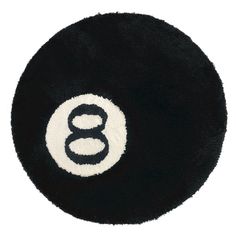 a black and white ball with the number eight on it