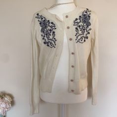 Brand New Never Worn Lovely Unique Cardigan Cream Floral Embroidered Cardigan For Spring, Cream Floral Embroidery Cardigan For Spring, Fitted White Cardigan With Floral Embroidery, Spring Embroidered White Cardigan, White Embroidered Spring Cardigan, White Embroidered Cardigan For Spring, Fitted Embroidered Crew Neck Cardigan, Fitted Crew Neck Embroidered Cardigan, White Embroidered Crew Neck Outerwear