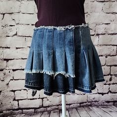 A Casual Slay, No Biggie. The Akira Label Asymmetrical Denim Mini Skirt Features A Slightly Stretchy Sandblasted Frayed Denim Fabrication, A Pleated Design, An Asymmetrical High Low Mini Length Silhouette, And An Hidden Side Zipper Closure. Complete With Raw Hem Detailing And Two-Tone Denim.. Style This Piece With A Cropped Button Down Blouse And Low Key Loafers For A Luxe Twist On The Pleated Mini Trend. - 75% Cotton 23% Polyester 2% Spandex - Some Stretch - Distressed Casual Look - Nwt All Mea Fitted Punk Denim Skirt, Edgy Fitted Dark Wash Mini Skirt, Edgy Fitted Cutoff Mini Skirt, Edgy Fitted Dark Wash Skirt, Fitted Denim Skirt In Grunge Style, Edgy Fitted Cutoff Denim Skirt, Edgy Fitted Denim Skirt With Frayed Hem, Edgy Fitted Dark Wash Denim Skirt, Fitted Denim Grunge Skirt