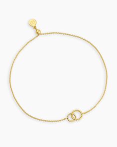 Crafted with luxe gold plating, this Crew Charm Bracelet is an elegant addition to any look. Featuring interlocking rings, this bracelet is dainty yet adjustable for any wrist size. A timeless design, this bracelet is the perfect accessory for any occasion. Crew Bracelet in 18k Gold, Women's by gorjana Chic Adjustable Yellow Gold Bracelet, Elegant Gold Bracelet With Adjustable Length, Chic Adjustable Gold Bracelet Tarnish Resistant, Elegant Gold Bracelets With Adjustable Clasp, Chic Adjustable Tarnish Resistant Gold Bracelet, Elegant Yellow Gold Bracelets With Adjustable Length, Modern Gold Jewelry With Adjustable Clasp, Elegant Yellow Gold Adjustable Bracelets, Chic Adjustable Gold Plated Chain Bracelet