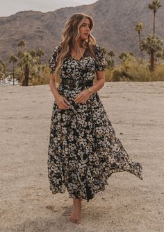 Boho Black & Yellow Floral Maxi Dress | LOVESTITCH Black Floral Print Short Sleeve Maxi Dress, Black Short Sleeve Maxi Dress With Floral Print, Black Bohemian Maxi Dress For Garden Party, Flowy Skirt Maxi Dress With Short Sleeves, Flowy Maxi Dress With Short Sleeves For Summer, Spring Breezy Short Sleeve Maxi Dress, Short Sleeve Flowy Maxi Dress For Beach, Flowy Short Sleeve Maxi Dress For Beach, Flowy Short Sleeve Maxi Dress For Spring