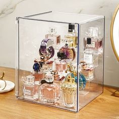 Say goodbye to cluttered desktops together, this beautiful luxury perfume or cosmetic stand organizer will complement any bathroom or dressing table, providing plenty of storage space for all of your belongings, keeping your makeup, skincare and perfume in one stylish place. In addition to this, you can also collect mini figure models, toys, etc., you can also put some dolls and bags by removing the dividers, it's super convenient to have two ways to use one box, come on to add a delicate and pr Perfume Stand, Perfume Storage, Makeup Display, Acrylic Nail Polish, Perfume Display, Perfume Organization, Acrylic Organizer Makeup, Acrylic Cabinets, Acrylic Display Stands