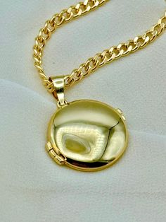 14k Gold Round locket Necklace, 24", with 3.7mm Curb Chain, 14.54 gr . Premium lobster clasp for added safety! Priced to sell! Compare our prices to other similar sellers! Arrives in a GIFT BOX and includes FREE SHIPPING within the USA and Canada. International shipping is available at the most economical rates on ETSY. I HAVE BEEN IN THE JEWELRY BUSINESS ALL MY LIFE. I am a second -generation family member making gold and jewelry. Please feel free to ask me any questions - Always happy to help! Gold Round Locket Necklace Tarnish Resistant, Gift Round Pendant Locket Necklace, Round Pendant Locket Necklace As Gift, Tarnish Resistant Round Pendant Locket Necklace Gift, Gold Tarnish-resistant Round Locket Necklace, Tarnish Resistant Round Pendant Locket Necklace, Round Tarnish Resistant Locket Necklace Gift, Gold Locket Necklace For Birthday, Personalized Gold Locket Necklace For Birthday