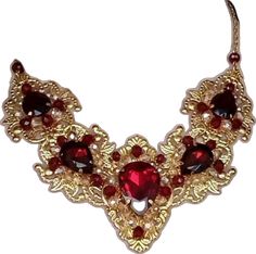 Red Gold-plated Jewelry Set For Wedding, Red Costume Jewelry Necklaces For Party, Red Metal Necklaces For Party, Elegant Gold Garnet Jewelry, Elegant Gold Necklace With Ruby, Elegant Gold Jewelry With Garnet, Ruby Jewel Bridal Necklace Gift, Festive Red Gold Plated Jewelry Sets, Festive Red Gold-plated Jewelry Sets