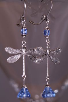 These Victorian style Dragonflies earrings are about 2 1/4 inches long. Accented with blue crystals and Czech floral beads. The Dragonflies are Sterling Silver Plated Brass. All orders come in a gift box. Elegant Dragonfly Earrings With Ear Wire, Elegant Dragonfly Jewelry With Ear Wire, Elegant Hypoallergenic Dragonfly Earrings, Elegant Dragonfly Jewelry For Jewelry Making, Nickel-free Blue Dragonfly Jewelry, Jewelry Victorian, Boho Trends, Nouveau Jewelry, Dragonfly Jewelry