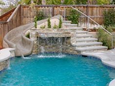 a pool with a slide next to it