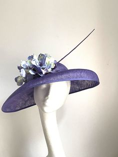 Violet disc hat Violet hat made of sinamay base attached to the rubber band. On the side is sitting matching hydrangea and a feather.  The hat is very elegant. The hat will be an amazing accessory to compliment your outfit at the Royal Ascot races, Kentucky Derby races, Wedding or a Garden party. The hat will fit an average head size. Enjoy your special day with this beautiful headpiece! Luxury Purple Mini Hats For Races, Ascot Outfits, Royal Ascot Races, Ascot Races, Violet Wedding, Kentucky Derby Party, Wedding Hat, Wedding Fascinators, Elegant Hats