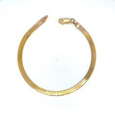 Vintage 14k yellow gold herringbone bracelet. The bracelet measures 8 inches long and 4.1mm wide. This bracelet weighs 4.84g. The bracelet also has a 14k gold lobster claw clasp. Formal 14k Gold Herringbone Necklace, Yellow Gold Plated Snake Chain Bracelet, Elegant Yellow Gold Herringbone Necklace With Lobster Clasp, Gold Herringbone Necklace With Lobster Clasp For Formal Occasions, Formal Gold Herringbone Necklace With Lobster Clasp, Yellow Gold Snake Chain Bracelet For Formal Occasions, Formal Yellow Gold Snake Chain Bracelet, Formal Gold 14k Herringbone Necklace, 14k Yellow Gold Snake Chain Bracelet