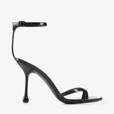 The Ixia is a barely-there sandal with a contemporary drop heel. Italian-crafted from patent leather, this modern shoe is an understated yet glamorous complement to your collection. It features a square toe, set on a flattering 95mm heel with an adjustable ankle strap fastening. Bridal Flat Sandals, Jimmy Choo Bing, Knee Boots Flat, Shearling Slippers, Bridesmaid Bags, Jimmy Choo Heels, Modern Shoes, Shoes Luxury, Sneaker Dress Shoes