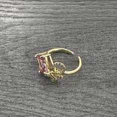 -Gold plated ring -Adjustable: Fits all sizes Adjustable Rose Gold Ring, Adjustable Gold Crystal Ring, Adjustable Gold Crystal Open Ring, Adjustable Gold Open Crystal Ring, Adjustable Rose Gold Metal Ring, Pink Adjustable Ring For Formal Occasions, Adjustable Rose Gold Toe Ring, Adjustable Gold Flower Ring For Formal Occasions, Pink Adjustable Formal Rings