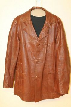 MENS VINTAGE CINNAMON BROWN LEATHER CAR COAT JACKET SZ XL ITEM FEATURES Brand: VINTAGE CINNAMON BROWN LEATHER CAR COAT JACKET  Material           Outside: Leather             Liner:   NYLON          Condition         Outside: Very Good. Minor nicks and scuffs.  (see pictures)         Liner:  RIPS AND FRAY (see pictures) Size: XL (SEE MEASUREMENTS) (Sizes vary between brands and eras, so please use the measurements below for a better gauge of actual size.) Measurements (measured flat) Chest (armp Vintage Long Leather Jacket For Fall, Retro Brown Leather Outerwear, Vintage Brown Business Outerwear For Fall, Business Outerwear In Vintage Brown For Fall, Vintage Brown Single Breasted Outerwear, Vintage Single-breasted Leather Outerwear, Vintage Longline Leather Jacket, Fall Business Vintage Brown Outerwear, Vintage Single-breasted Outerwear In Vintage Brown