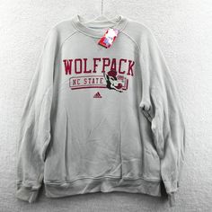 New Adidas Nc State Wolfpack Sweatshirt Size: Large Measurements Are Displayed In The Photos, View Them Prior To Purchase To Ensure Your Desired Fit New With Tags In Excellent Condition With No Stains, Holes, Or Odors Enjoy Lightning Fast Shipping Message Response Times I Ship Items Every Day, You Can Expect Your Order To Be Sent Out Within 1 Business Day And Tracking Provided Browse Our Store To See Other Ncaa College Shirts, Hats, Sweatshirts, And More! Adidas Sweatshirt With Letter Print For Sports, Adidas Sports Sweatshirt With Letter Print, Adidas Cotton Sweatshirt For Sports, Gray Adidas, Nc State Wolfpack, College Shirts, Retro Tops, Nc State, Wolf Pack