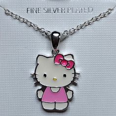 a hello kitty necklace with a pink bow on it's head and the word fine silver plated