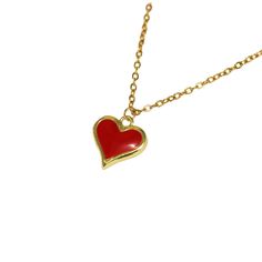 Minimalist red heart pendant! The delicate gold chain is the perfect complement to the sleek and modern red heart pendant, creating a beautiful and understated piece that is perfect for any occasion. The beauty of this necklace lies in its versatility, as it can be dressed up or down to suit any occasion or outfit. It's the perfect piece to add to your collection or to give as a thoughtful and heartfelt gift. Minimalist Red Heart-shaped Jewelry, Minimalist Red Heart Necklace, Red Heart Pendant Necklace With Clavicle Chain, Red Dainty Charm Necklace With Heart Charm, Dainty Red Charm Necklace For Valentine's Day, Red Heart Charm Necklace With Clavicle Chain, Red Heart-shaped Clavicle Charm Necklace, Red Heart Necklace With Clavicle Chain, Red Heart Clavicle Chain Necklace