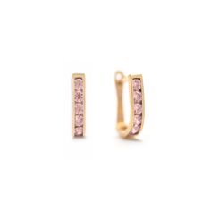 These 14K Gold huggies feature tiny pink gemstones. Great birthday gift! 14K Solid Gold Pink Sapphire Cubic Zirconia Gemstone Thickness 2mm(0.08in) Inside diameter 7mm(0.28in) Hinge with lock closure #ES150-GPK Dainty Pink Huggie Earrings For Gift, Pink Single Huggie Earring For Everyday, Pink Gold Huggie Jewelry Gift, Pink Hypoallergenic Small Hoop Huggie Earrings, Pink Huggie Pierced Jewelry, Great Birthday Gifts, Pink Gemstones, Pure Gold, Pink Crystal