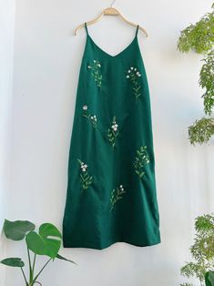 ❤ The hand embroidered linen dress is very soft, skin friendly, breezy and comfortable. ❤ Item description: - A lovely dress with embroidered flowers motifs. - Suitable for hot summer. - Material: linen, button, embroidery threads. - Environmentally friendly. - This dress is very useful, go with any outfit, that can be used to go out, go shopping... It is a perfect gift for yourself or your beloved. ❤ Care instructions: The best way to wash embroidery cloth is to put it in soapy water (with a mi Summer Dresses With Floral Embroidery And Spaghetti Straps, Summer Floral Embroidery Spaghetti Strap Dress, Summer Floral Embroidered Spaghetti Strap Dress, Cotton Midi Dress With Floral Embroidery For Vacation, Vacation Sundress With Floral Embroidery And Spaghetti Straps, Cotton Embroidered Midi Dress For Garden Party, Summer Cotton Midi Dress With Floral Embroidery, Casual Floral Embroidered Dress For Garden Party, Summer Embroidered Cotton Dress For Brunch