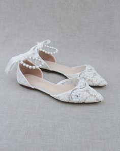 "FIT: STYLE RUNS LARGE, ORDER 1/2 SIZE SMALLER Lace pointy toe flats for comfortable wear throughout your special day. We've added satin lace up ribbon to make this a ballerina shoe. Perfect wear as bridal shoes, bridesmaids, mother of the bride, bridal shower, romantic dining, or any of your special events. ** YOU CAN CHOOSE TO DO ANKLE STRAP IN SATIN BALLERINA LACE UP, ORGANZA BALLERINA LACE UP, ANKLE STRAP OR PEARLS ANKLE STRAP- OPTION IS AVAILABLE AT CHECKOUT ** DETAILS: COLORS AVAILABLE: Du Lace Flat Heel Wedding Shoes For Spring, Spring Lace Flat Heel Wedding Shoes, Spring Wedding Flats With Flat Heel, Spring Wedding Pointed Toe Closed Flats, Lace Wedding Shoes With Flat Heel For Spring, Spring Wedding Lace Shoes With Flat Heel, Flat Heel Lace Wedding Shoes, Lace Flat Heel Wedding Shoes, Lace Flat Heel Wedding Shoes For Ceremony