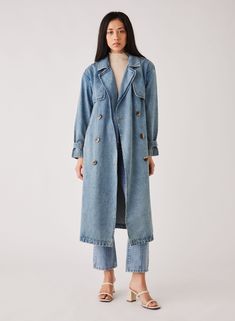 • Esmaee Midwest Trench Coat • Drop shoulder • Collared neck • Double breasted • Long sleeve • Front pockets • Removable waist belt • Calf length Style No: 2291.5563 Content: 100% Cotton Model height: 177cm / 5' 9½in | Model wears Size XS Cheap Washed Blue Outerwear For Work, Cheap Denim Blue Single Breasted Outerwear, Affordable Washed Blue Outerwear For Work, Luxury Relaxed Fit Denim Jacket With Pockets, Luxury Denim Jacket With Pockets For Workwear, Luxury Rigid Denim Outerwear With Pockets, Luxury Washed Blue Outerwear For Work, Luxury Denim Utility Jacket For Work, Luxury Denim Jacket With Double-needle Sleeve For Work