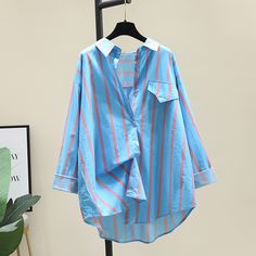 Our stylish Vertical Striped Button-Down Blouse is perfect for any occasion! Get ready to turn heads at work or on the town. The vertical stripes will add an extra dimension of sophistication to your outfit and is available in three different colors. Clothing Preppy, Suit Shirt, Female Clothes, Loose Fashion, Clothes Casual, Clothing Pants, Suit Women, Female Clothing, Square Neck Top