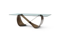 a glass and metal table with a curved design on it's base, against a white background