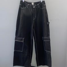 Nwt, In Great Condition. Eu 44. High Rise, Belt Loops, Pockets And Wide Leg. (Looks Lighter Due To Overhead Lighting) Black Cargo Pants With Contrast Stitching For Streetwear, Casual Black Bottoms With Contrast Stitching, Black Straight Leg Cargo Pants With Contrast Stitching, Black Baggy Bottoms With Contrast Stitching, Baggy Wide-leg Pants With Contrast Stitching, Trendy Black Cargo Pants With Contrast Stitching, Black Straight Leg Pants With Contrast Stitching, Black Wide Leg Pants With Contrast Stitching, Trendy Black Pants With Contrast Stitching