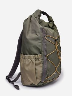 a backpack that is green and brown