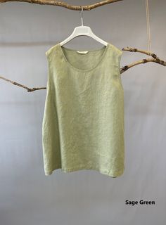 "Simple, relaxed and comfortable linen tank top. Can be worn un-tucked as lounge top or tucked as a chic tank top. * 100% Linen * Wide comfy straps * Scoop neck with back button closure * Straight silhouette * Fabric has been pre-washed to prevent shrinkage in the future * Matching shorts available https://www.etsy.com/listing/840638705/linen-shorts-women-ruffle-hem-shorts?ref=shop_home_active_1&frs=1&crt=1 Please provide your full bust measurement (measured around the fullest part) and Linen Lounge, Linen Camisole, Chic Tank Tops, Linen Shorts Women, Tank Top Shorts, Top Shorts Set, Cropped Linen Pants, Linen Fashion, Linen Tank Top