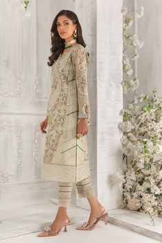 Embellished Long Sleeve Salwar Kameez, Designer Embellished Long Sleeve Salwar Kameez, Designer Long Sleeve Embellished Salwar Kameez, Festive Embellished Semi-stitched Lawn Suit, Festive Semi-stitched Embellished Lawn Suit, Embellished Long Sleeve Georgette Traditional Wear, Elegant Georgette Blouse Piece With Printed Motifs, Long Sleeve Embellished Chanderi Dress, Elegant Fitted Blouse With Printed Motifs