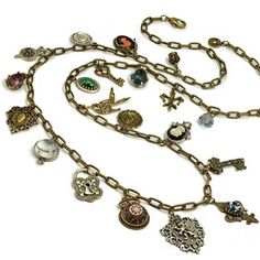 Vintage Curiosity Necklace N1434 Bohemian Medallion Necklace With Vintage Charm, Bronze Pendant Necklace With Charms, Vintage Pendant Charm Necklace With Dangling Charms, Vintage Charm Necklace With Dangling Pendants, Vintage Charm Necklace With Dangling Charms For Jewelry Making, Vintage Charm Necklaces With Dangling Charms For Jewelry Making, Vintage Charm Medallion Necklace Styled As Amulet, Vintage Metal Charm Necklace, Vintage Charm Medallion Amulet Necklace