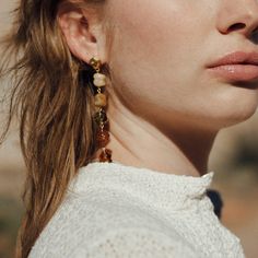 The CLED Shades of Nature Sandstone Earrings draw inspiration from the beauty of nature and there is still so much to show. The colors of the landscape are exhibited in this dangling earring. Available in short, long, and mixed pairs. Choose your favorite way to wear it! Gold Vermeil Hand-formed Eco Gem repurposed from discarded glass bottles Length: Long 3 in | 7.5-8 cm, Short 1.4 in | 3.5 cm Made in Los Angeles Please allow 1-2 weeks for shipping as all pieces are made to orders Packing Jewelry, Upcycled Jewelry, Cosmetics Brands, Earring Sale, Short Long, Single Earring, Ring Size Guide, The Landscape, Long Earrings