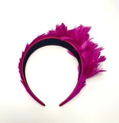 Headband with natural feathers, collection: "Jardín de plumas", JARDIN DE BUGANVILLAS or JARDIN DE VIOLETAS models. Wide headband base (4 cm) lined with satin and completely covered on the outside with natural goose feathers dyed in bougainvillea color. Decorated on one side by a bouquet of flowers made with the same feathers as the headband. It is a particularly dark and intense shade of fuchsia, close to magenta. Available without veil or with veil. Upon request it can be made in a conventiona Pink Feather Trim Headpieces For Party, Adjustable Pink Feathered Fascinator, Purple Feather Headpieces For Spring, Adjustable Pink Feather Fascinator, Pink Adjustable Fascinator With Feathers, Adjustable Pink Fascinator With Feathers, Adjustable Pink Feather Trim Headpieces, Pink Adjustable Feather Trim Headpieces, Adjustable Feather Headband