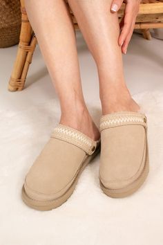 Introducing Hallie, your new favourite slipper crafted from 100% natural authentic sheepskin. This versatile slipper offers multiple ways to wear with its two detachable straps: a fluffy sheepskin statement band and an intricate tonal embroidered strap for a trendy look. Whether worn behind the ankle, for extra security, or over the front of the mule-style slipper, Hallie effortlessly blends comfort with style. The sheepskin lined interior ensures superior cosiness and comfort, making it ideal f Sheepskin Slippers, Embroidered Shoes, Stocking Fillers For Her, Forever Jewelry, Women's Slippers, Jewelry Ring Box, Women Helping Women, Mens Jewelry Bracelet, Gifts For Mum