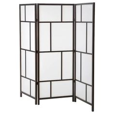 a black and white room divider with four panels