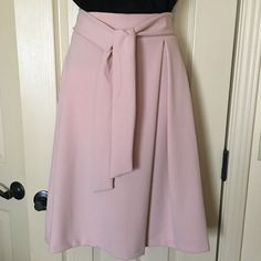 A-Line Skirt With Separate Sash. New Never Worn. Dusty Rose Pink. Invisible Zipper Closure. 2” Waist Band,Looped For Sash Or Other Belt. Length 25” Waist 15 1/2” Laying Flat. Chic Pink A-line Bottoms, Pink A-line Workwear Skirt, Pink A-line Skirt For Workwear, Elegant Knee-length Skirt With Tie Waist, Chic Pink Belted Bottoms, Elegant Mini Skirt With Tie Waist, Chic Tie Waist Flared Skirt, Chic Flared Skirt With Tie Waist, Elegant Pink Lined Wrap Skirt