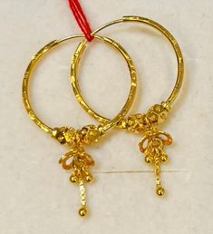 Dangling jimiki styles bali rajkot earrings Gold purity: 916 gold Hallmark: 916 stamped Appx Weight : 3.50 - 3.60grams Size: pls see picture with ruler Design : 25mm beautiful dangling jimiki bali Earrings. Similar random design depending on stocks availibility  FAQs Q: Is it real gold? A: yes it's real authentic genuine 916 gold Q: can pawn? A: yes it's pawnable ⭐GoForGold⭐ Luxury Gold Chandbalis For Eid, Luxury Round Gold Plated Danglers, Luxury 22k Yellow Gold Chandbalis, Elegant 22k Gold Chandbalis Luxury, Luxury Gold Plated Chandbalis For Festivals, Luxury Yellow Gold Plated Chandbalis, Luxury Yellow Gold Chandbalis For Festivals, Yellow Gold Danglers For Diwali, Yellow Gold Danglers For Festivals